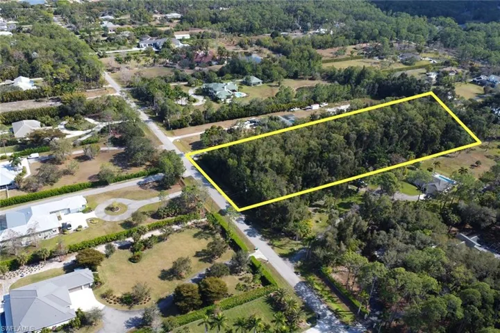 Aerial perspective of suburban area with property boundaries highlighted