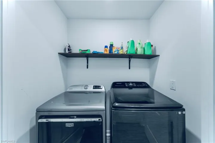 Laundry room featuring laundry area and washing machine and dryer