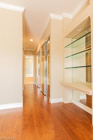 Master bedroom hallway leading to bath