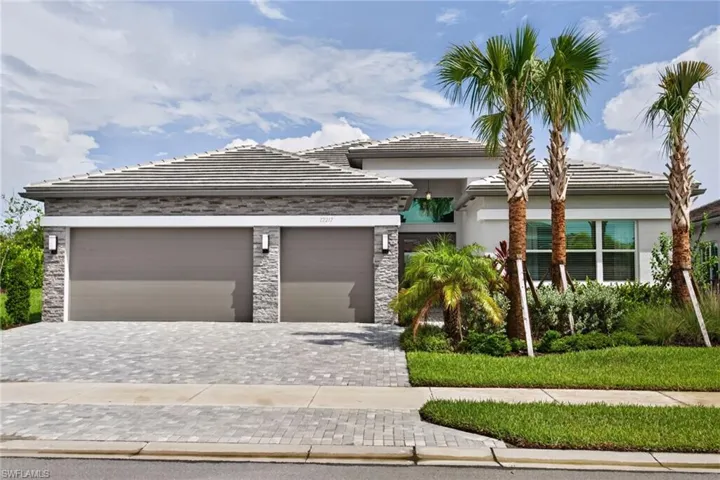 Contemporary single-story residence with a multi-gabled tile roof