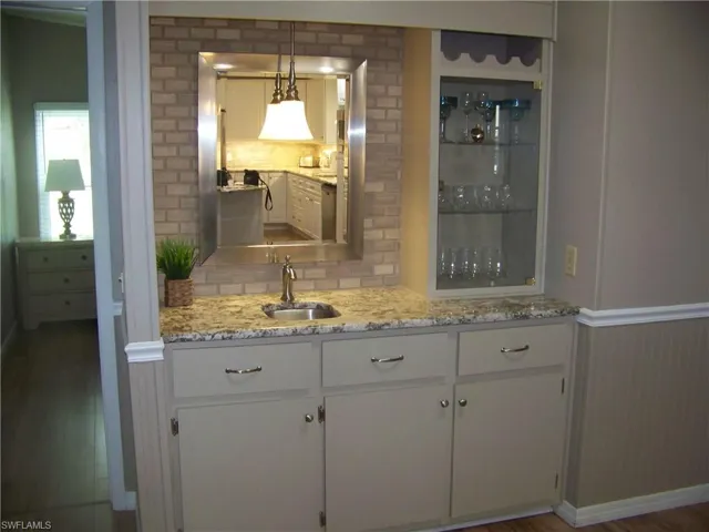 Granite wet bar with all the extras in Family Room