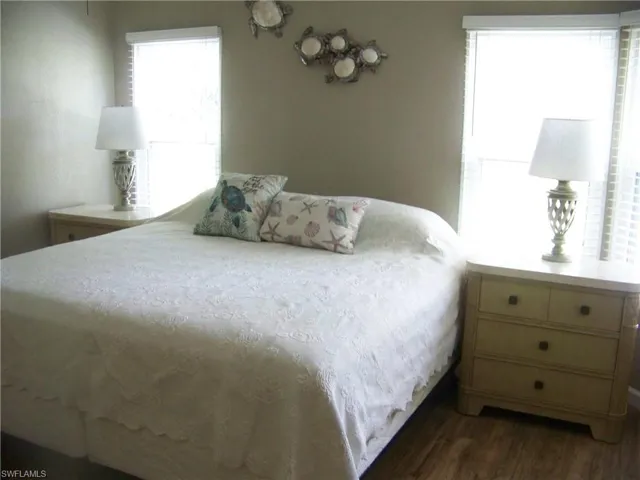 Very well-lit master bedroom with 4 windows