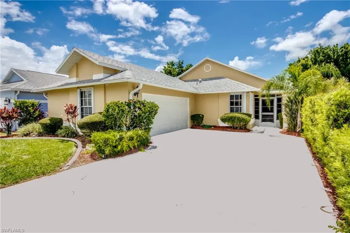 Ranch-style home with a garage