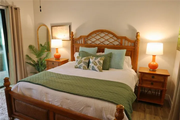 Cabana bedroom featuring wood-type flooring