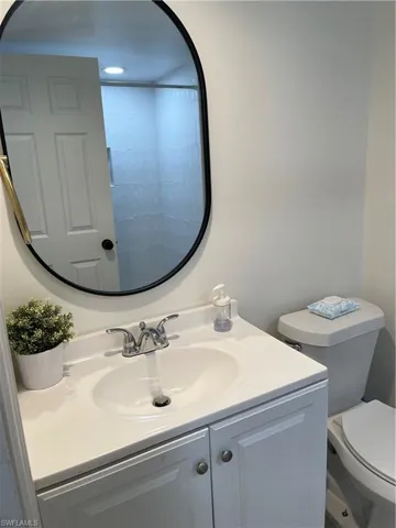 Bathroom featuring toilet and vanity