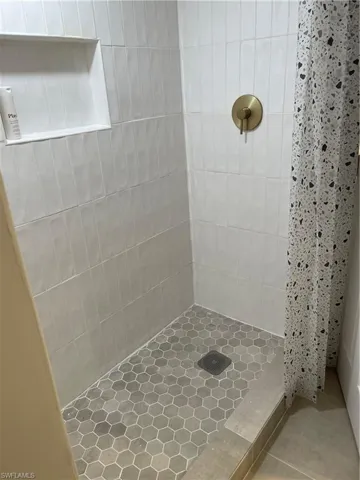 Bathroom featuring walk in shower