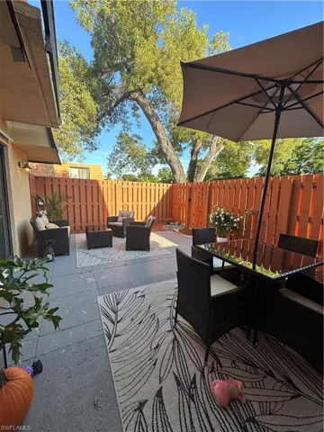 Wooden deck with a patio area
