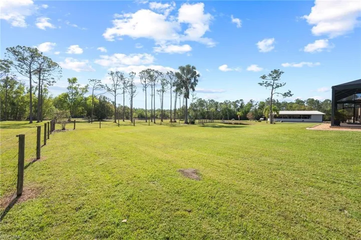 View of yard with a rural view