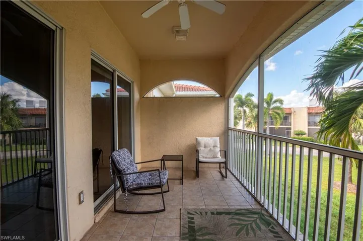 Balcony featuring ceiling fan