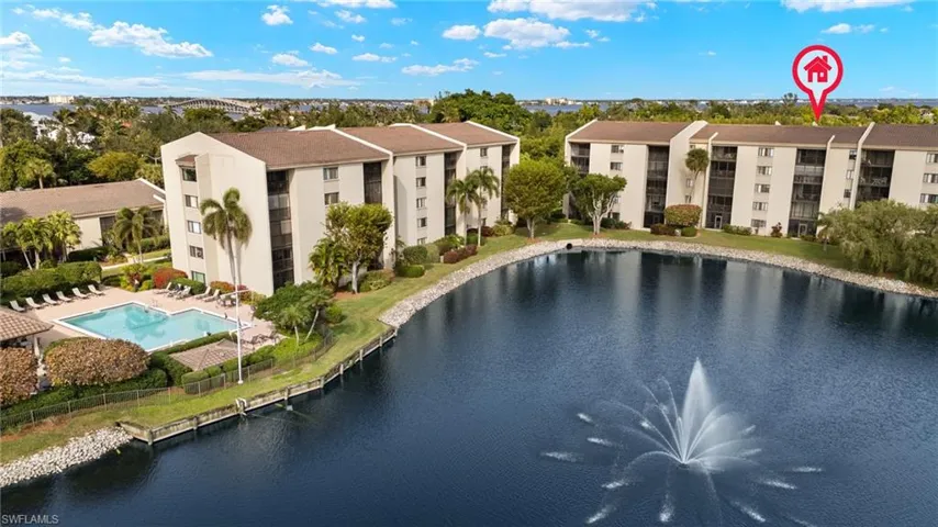 View of swimming pool featuring a water view