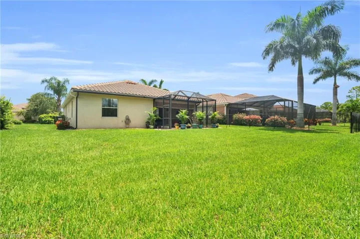 View of yard featuring a lanai
