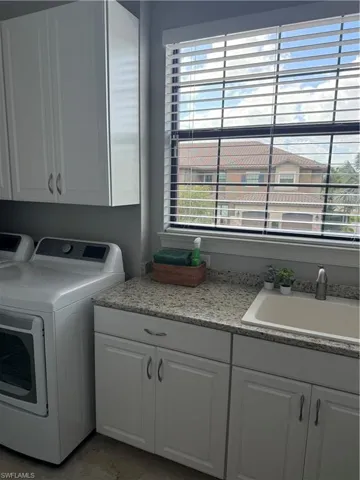 Laundry room with cabinet space