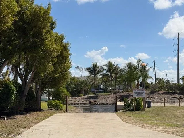 View of property's community featuring a gate