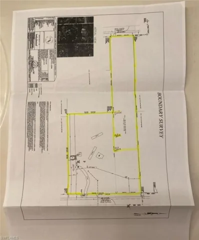 Survey map / technical document with property boundaries highlighted