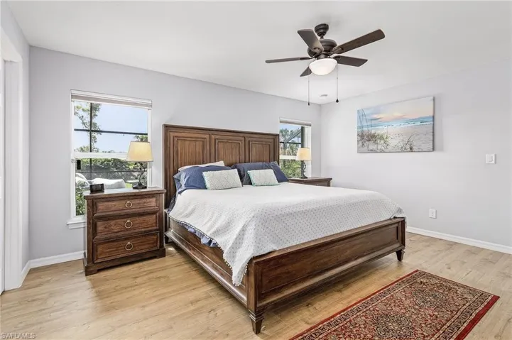 Bedroom featuring light wood-style floors and ceiling fan