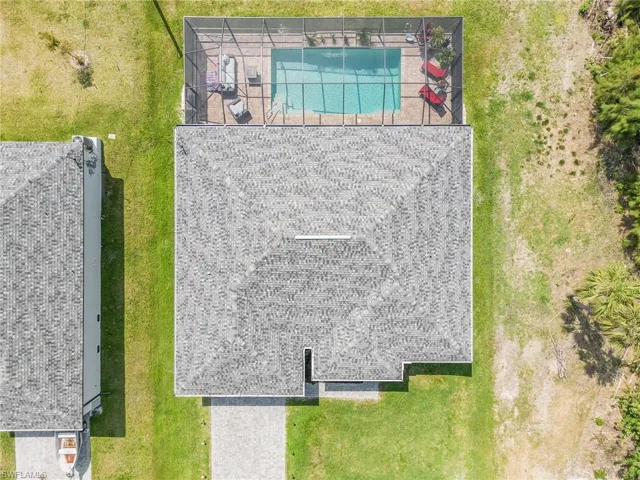 Aerial view of home with pool