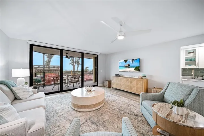 Cozy living room with a view of the pool and Gulf of Mexico