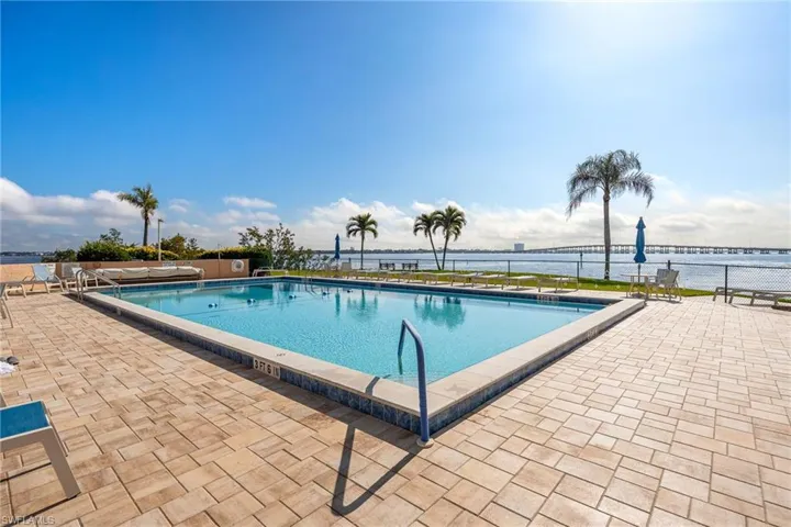 Community pool featuring a patio area