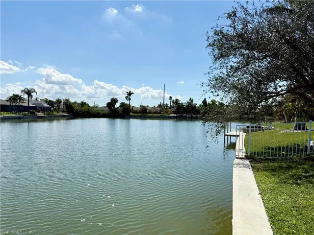 Water view with a boat dock