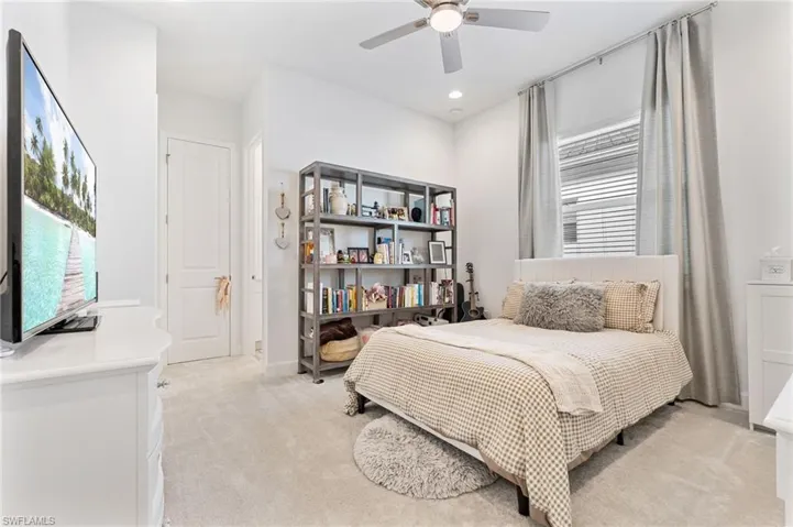 2nd bedroom with ensuite bathroom and walk-in closet.