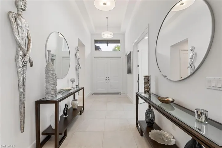 Stunning foyer entrance with  14' coffered ceiling.