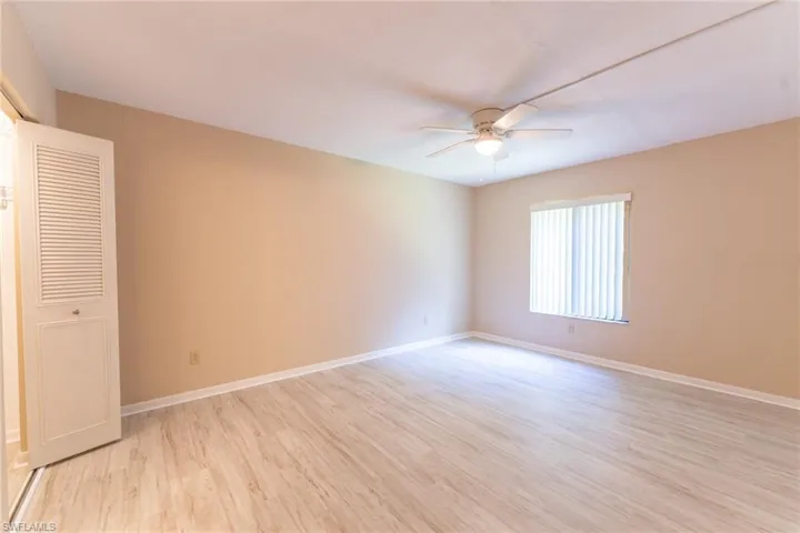Unfurnished room featuring light hardwood / wood-style floors and ceiling fan