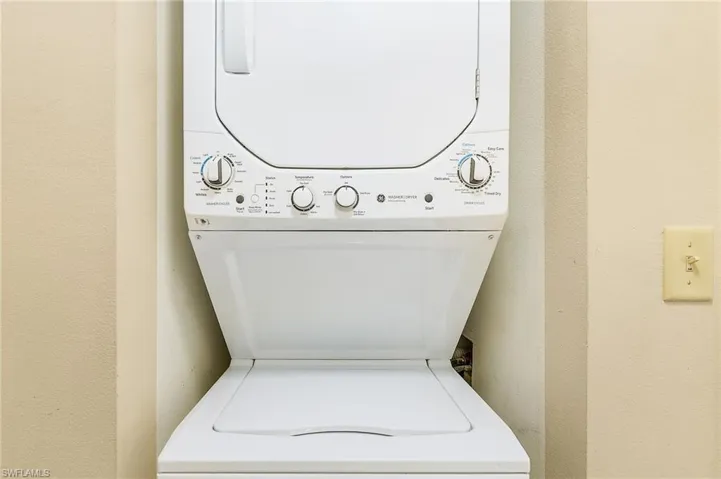 Laundry room with stacked washer / drying machine