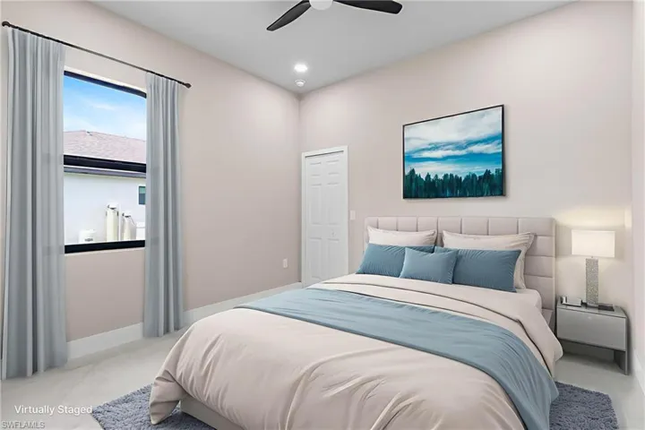 Bedroom featuring recessed lighting and a ceiling fan