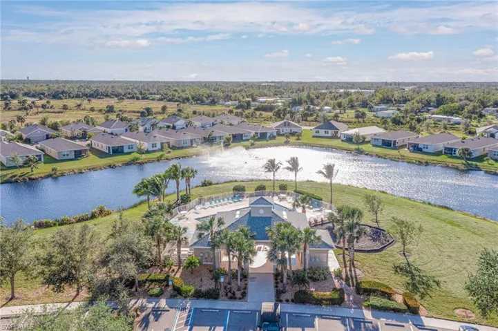 Aerial perspective of suburban area with a large body of water