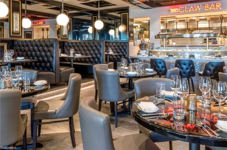 Downstairs is the Claw Bar, a popular Naples restaurant with a great Happy Hour