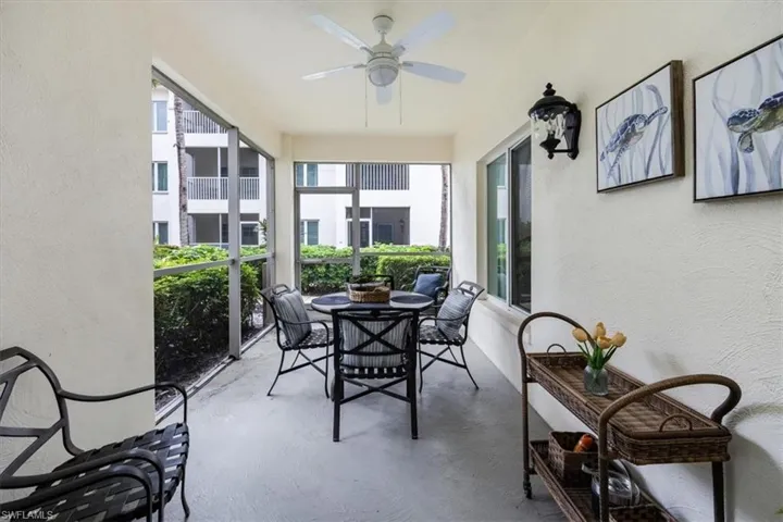 Patio with ceiling fan and plenty of seating