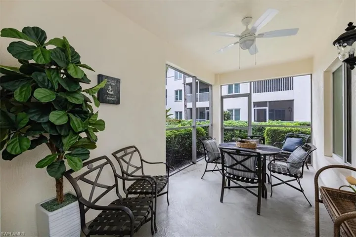 Patio with ceiling fan and plenty of seating