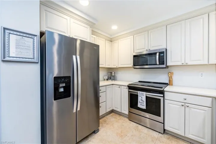 Kitchen with stainless steel appliances comes turnkey