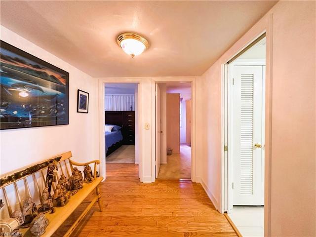 Hallway looking towards bedrooms and bath