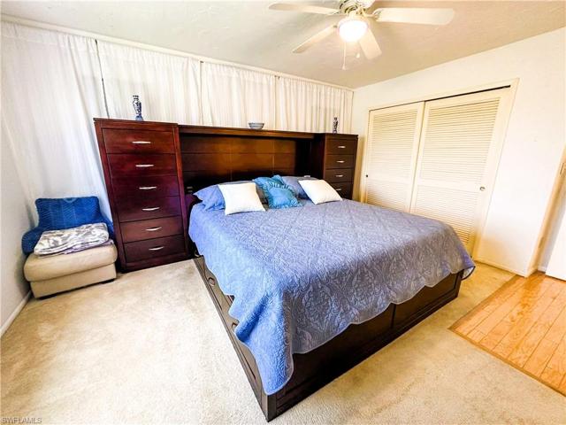 Another view of master bedroom. (2 windows with blackout shades behind master bed)