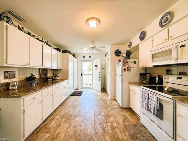 View of kitchen from dining room entrance