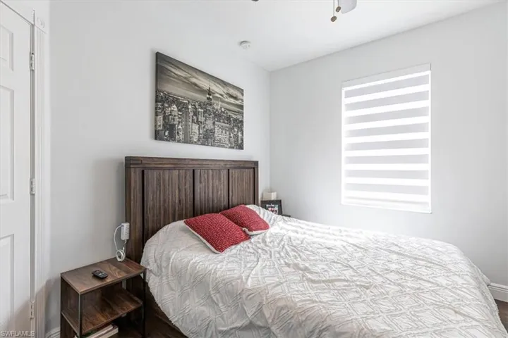 Bedroom featuring baseboards and ceiling fan