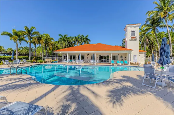 Community pool with a patio area
