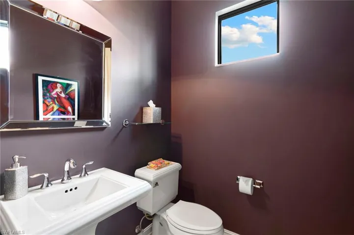 Half bathroom featuring toilet