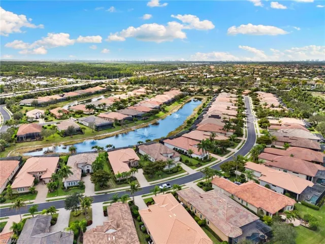 Aerial view of residential area with a large body of water