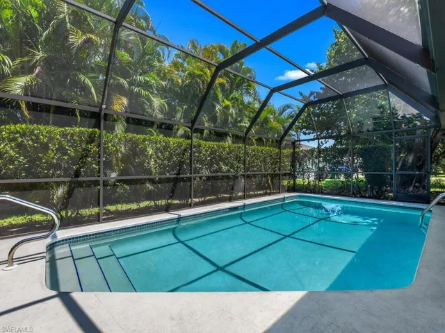 View of pool featuring a lanai