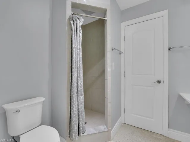 Bathroom with walk in shower and toilet