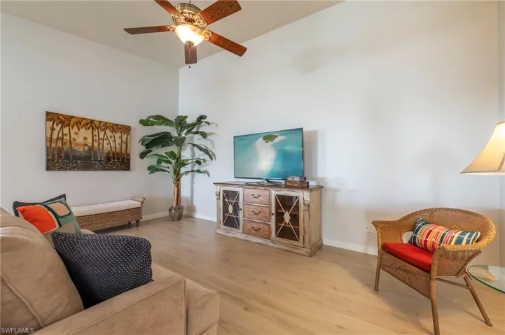 15416 Almaco Cir Bonita Springs FL 34135 - Living room with beautiful new wood look tile flooring