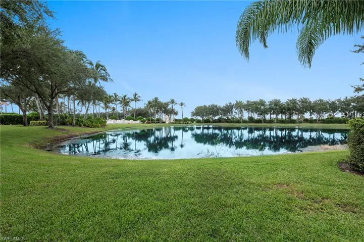 15416 Almaco Cir Bonita Springs FL 34135 - Private lined lake has a water feature and year round water.
