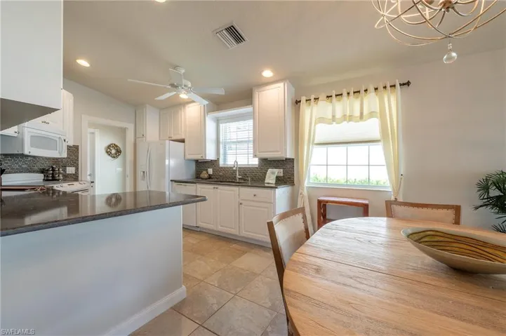15416 Almaco Cir Bonita Springs FL 34135 - Kitchen and dining area