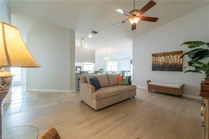15416 Almaco Cir Bonita Springs FL 34135 - Living area just off kitchen and dining area
