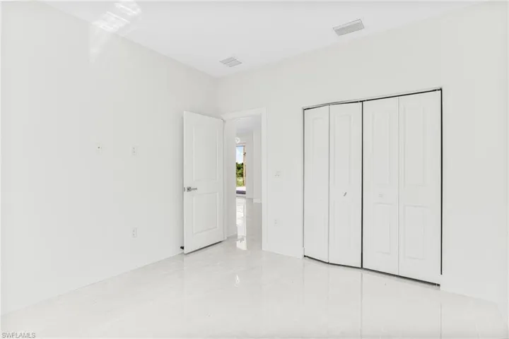 Unfurnished bedroom with a closet