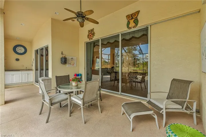 View of patio / terrace featuring ceiling fan