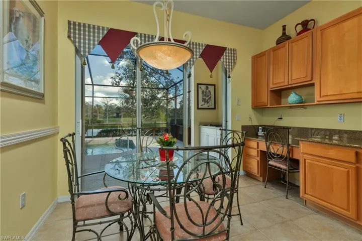 Dining area featuring light tile patterned floors