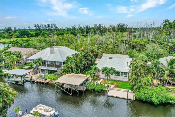 Aerial of house, boat house & dock